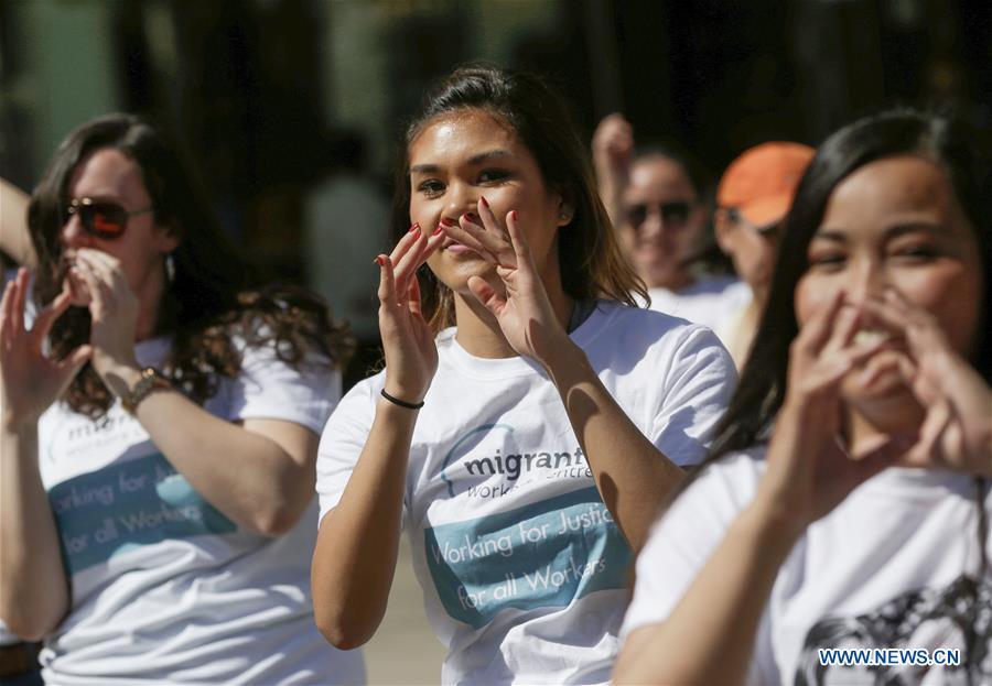 CANADA-VANCOUVER-MIGRANT WORKERS-FLASH MOB