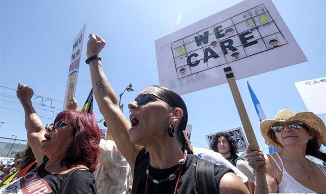 People take to streets across America to protest Trump's immigration policy